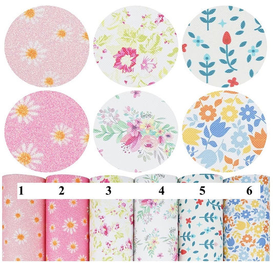 A collection of six floral patterned faux leather items.